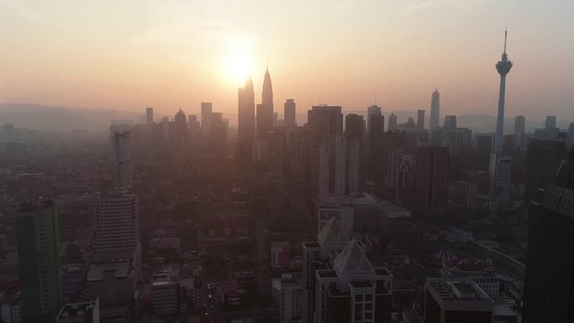 Aerial view of Kuala Lumpur city in Malaysia capital, tall buildings. Cinematic video of skyscrapers in big City.