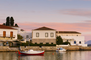 Fototapeta na wymiar Houses in the harbor of Spetses village, Greece. 