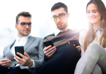 closeup. employees talking in the workplace