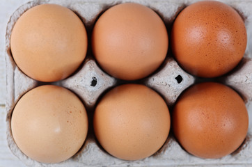 Farm Fresh Chicken Eggs arranged by color. Easter concept