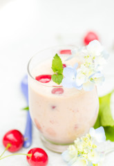 Refreshing summer drink fruit cocktail cherries