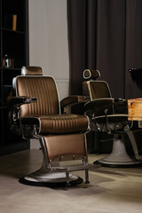 Stylish Vintage Barber Chair In Barber Shop. Barbershop Theme
