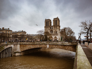 Fototapeta na wymiar Notre Dame Cathedral is located in the heart of Paris on the largest island of the Seine.