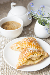 Crispy patties of puff pastry with apples and coffee