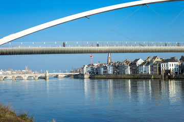 Fototapeta premium Pedestrian bridge over river Maas
