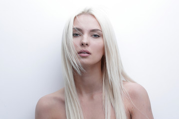 Close-up of a worried beautiful woman blonde - obrazy, fototapety, plakaty