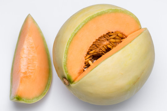 Orange melon - Cantaloupe - on a white background with a slice on the side - Cantaloupe melon