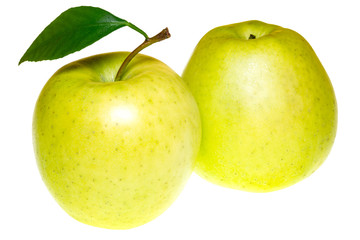 Two green apples with leaf isolated on white
