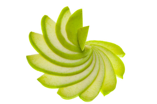Top view of a group of green apple slices isolated on a white background.