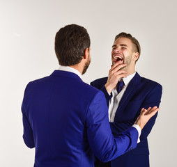 Business and friendship concept. Man in jacket listening