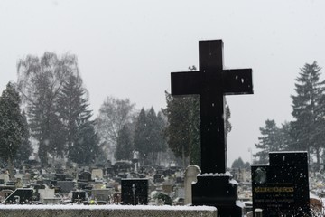 Cemetery covered by snow in winter. Slovakia