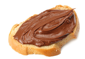 Slice of bread with chocolate cream isolated on white background