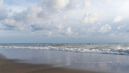 beach in Italy with tourists