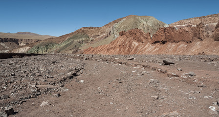 Rainbow Valley (Valle Arcoiris), in the Atacama Desert in Chile. The mineral rich rocks of the Domeyko mountains give the valley the varied colors from red to green.