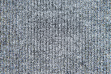 New wool carpet pattern closeup texture, grey color.