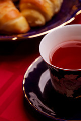 Cup of tea on the red table