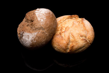 bread roll, bread on a black background, isolated