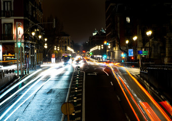 Fototapeta na wymiar Big city lights by moving cars