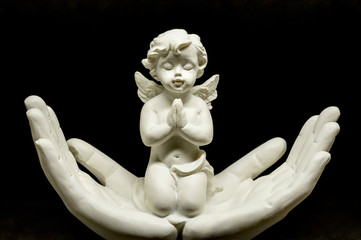 little angel is praying