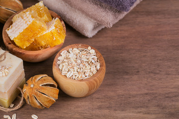 Fototapeta na wymiar Honeycomb, sea salt, oatmeal and handmade soap with honey