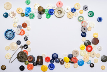 Buttons of different colors on a white background