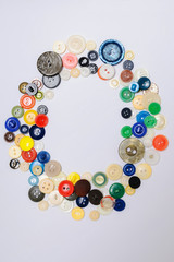 Buttons of different colors in the form of a circle on a white background