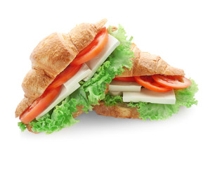 Tasty croissant sandwiches on white background