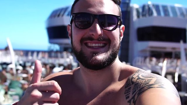 Man Taking a Selfie on Cruise Ship