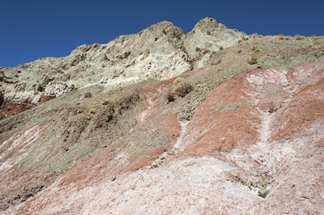 Rainbow Valley (Valle Arcoiris), in the Atacama Desert in Chile. The mineral rich rocks of the Domeyko mountains give the valley the varied colors from red to green.