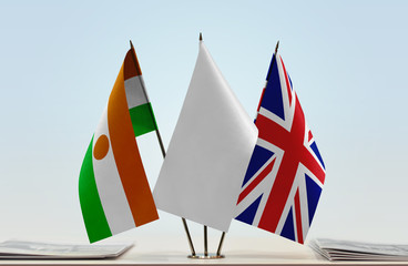 Flags of Niger and United Kingdom with a white flag in the middle