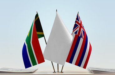 Flags of Republic of South Africa and Hawaii with a white flag in the middle