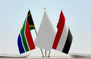 Flags of Republic of South Africa and Yemen with a white flag in the middle