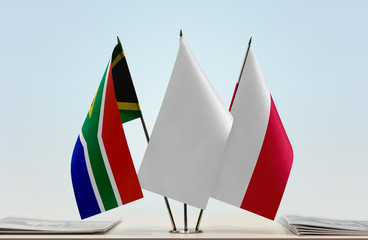 Flags of Republic of South Africa and Poland with a white flag in the middle