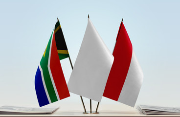 Flags of Republic of South Africa and Monaco with a white flag in the middle
