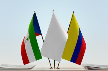 Flags of Equatorial Guinea and Colombia with a white flag in the middle