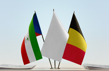 Flags of Equatorial Guinea and Belgium with a white flag in the middle