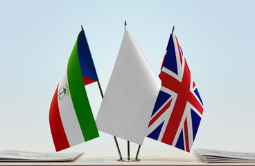 Flags of Equatorial Guinea and United Kingdom with a white flag in the middle