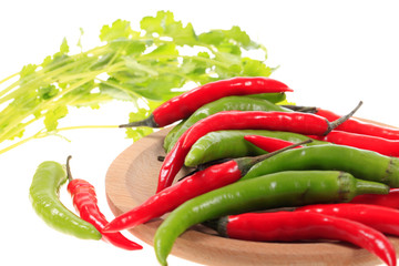 Red pepper, green chilli, peppercorns, coriander and onion, food background