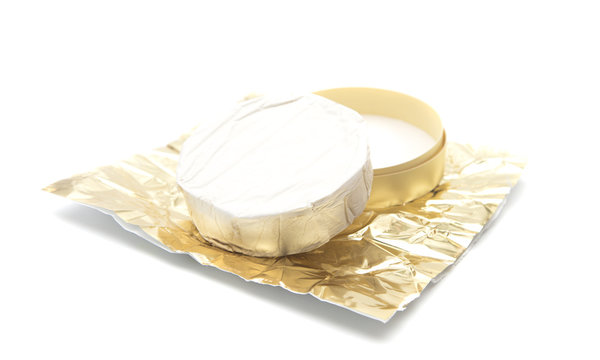 Beautiful Round of Soft Cheese with Gold Foil Wrapper