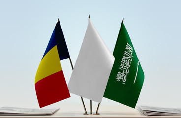 Flags of Chad and Saudi Arabia with a white flag in the middle