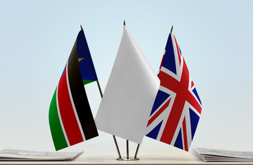 Flags of South Sudan and United Kingdom with a white flag in the middle