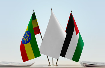 Flags of Ethiopia and Palestine with a white flag in the middle