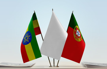 Flags of Ethiopia and Portugal with a white flag in the middle