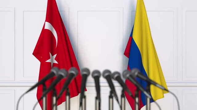 Flags of Turkey and Colombia at international meeting or negotiations press conference
