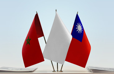 Flags of Morocco and Taiwan with a white flag in the middle