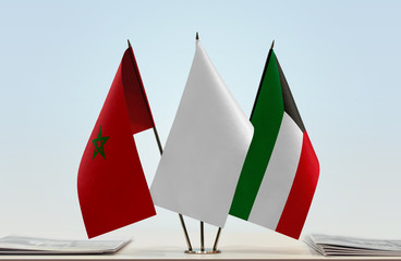 Fototapeta na wymiar Flags of Morocco and Kuwait with a white flag in the middle