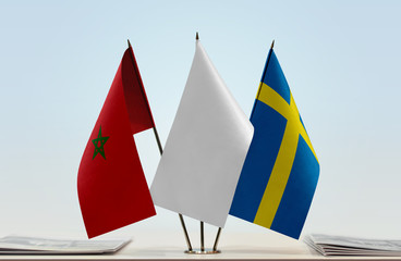 Flags of Morocco and Sweden with a white flag in the middle