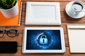 Web security and technology concept with tablet pc on wooden table