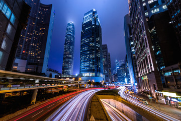 Fototapeta na wymiar Hong Kong Central Business District at Night with Light Track