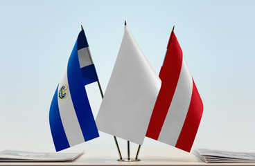 Flags of El Salvador and Austria with a white flag in the middle
